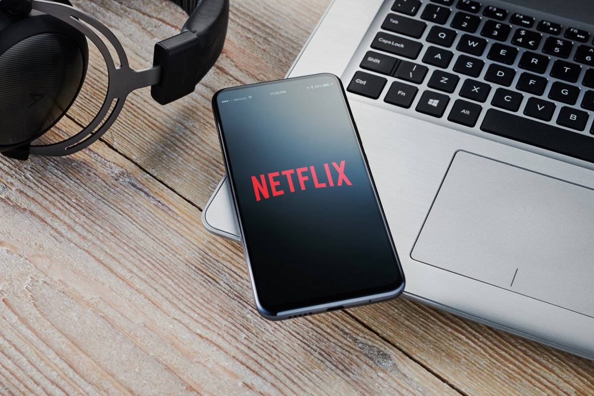 An Android smartphone with the Netflix logo visible.