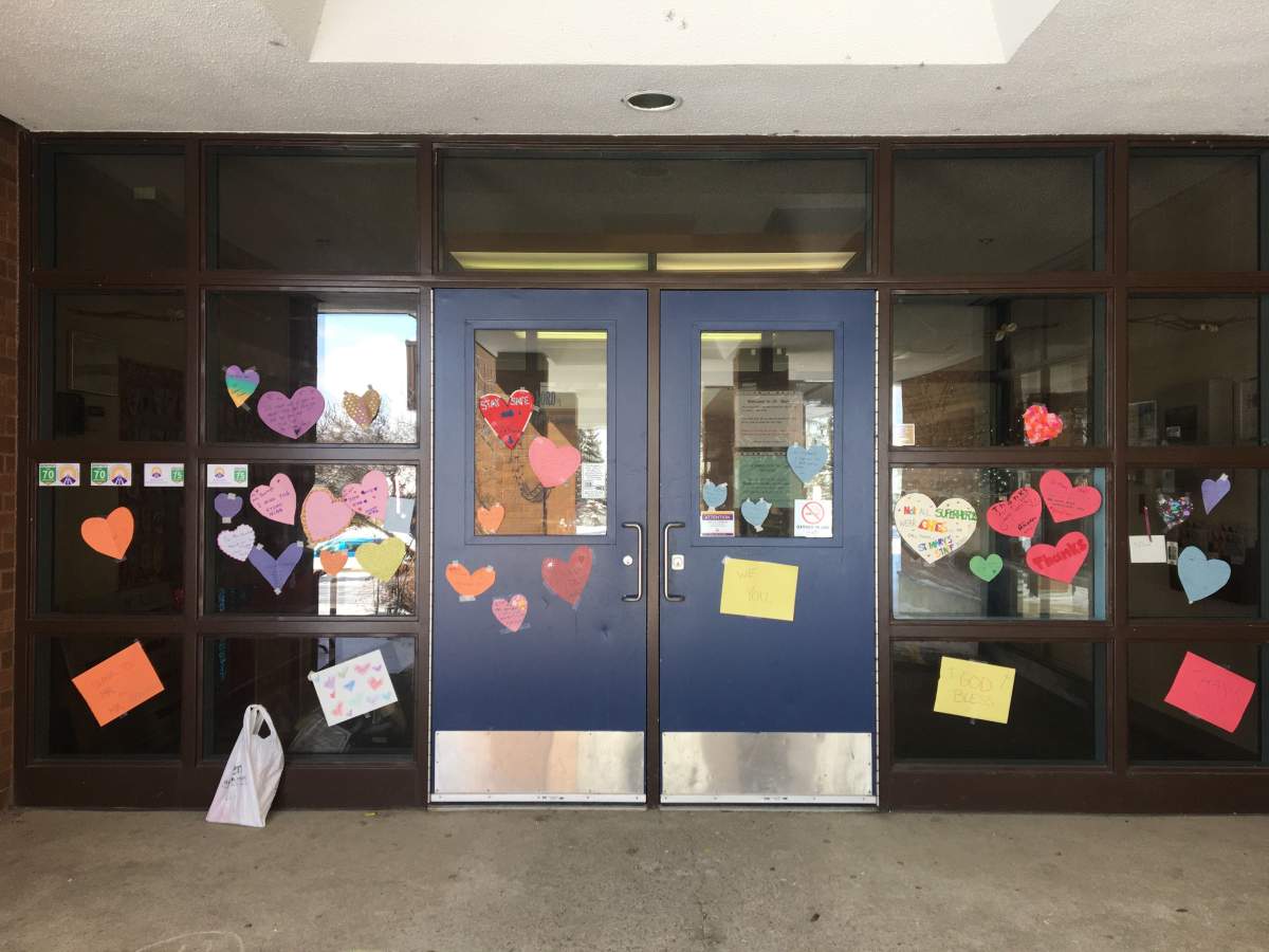 Sweet messages were left by students, parents and families on the doors at St. Mary Catholic School in southwest Edmonton’s Riverbend area on Tuesday, March 31, 2020.