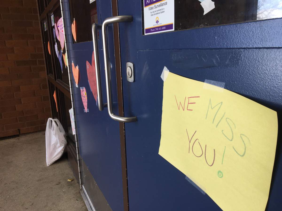 Sweet messages were left by students, parents and families on the doors at St. Mary Catholic School in southwest Edmonton’s Riverbend area on Tuesday, March 31, 2020.