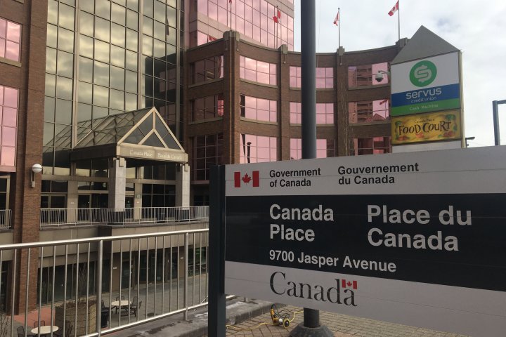 Hopeful — and tired — Albertans face long waits at Edmonton passport office