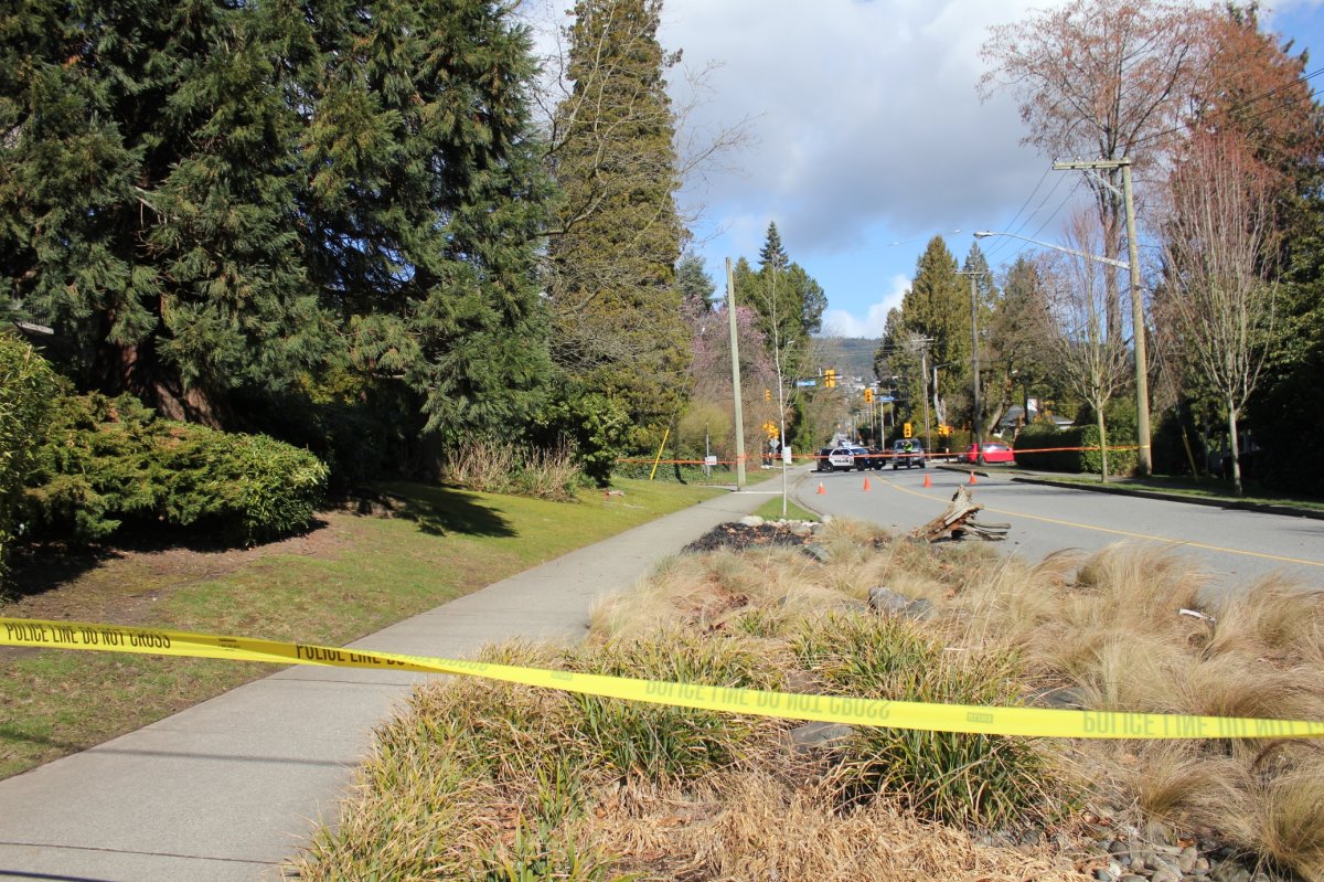 Police investigate a hit-and-run in West Vancouver on March 11, 2020. 