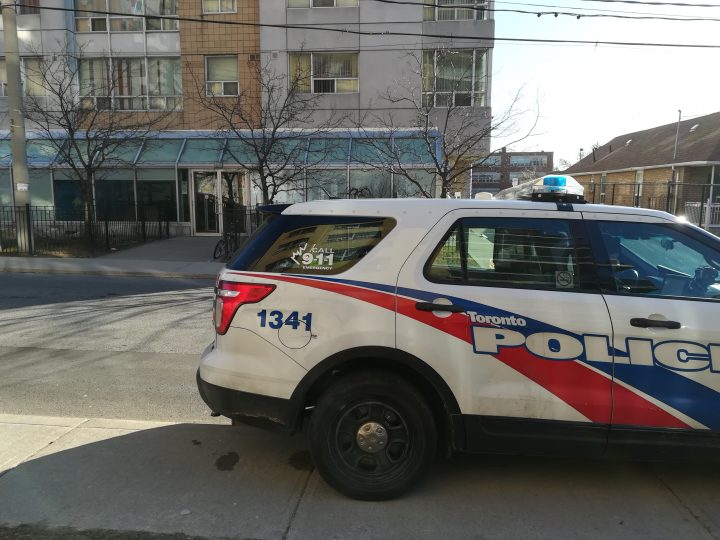 Police at the scene of the stabbing near Dufferin Street and Eglinton Avenue West early Sunday.