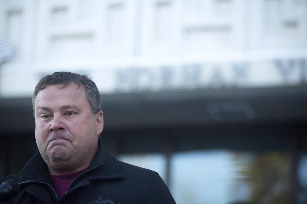 Scott Thomas, father of Humboldt Broncos bus crash victim Evan Thomas, speaks to media outside provincial court in Melfort, Sask., on January 8, 2019. A father whose son was killed in the deadly Humboldt Broncos collision says he worries the Saskatchewan Government's move to relax some trucking rules around COVID-19 may mean drivers will be pushed past their limits.