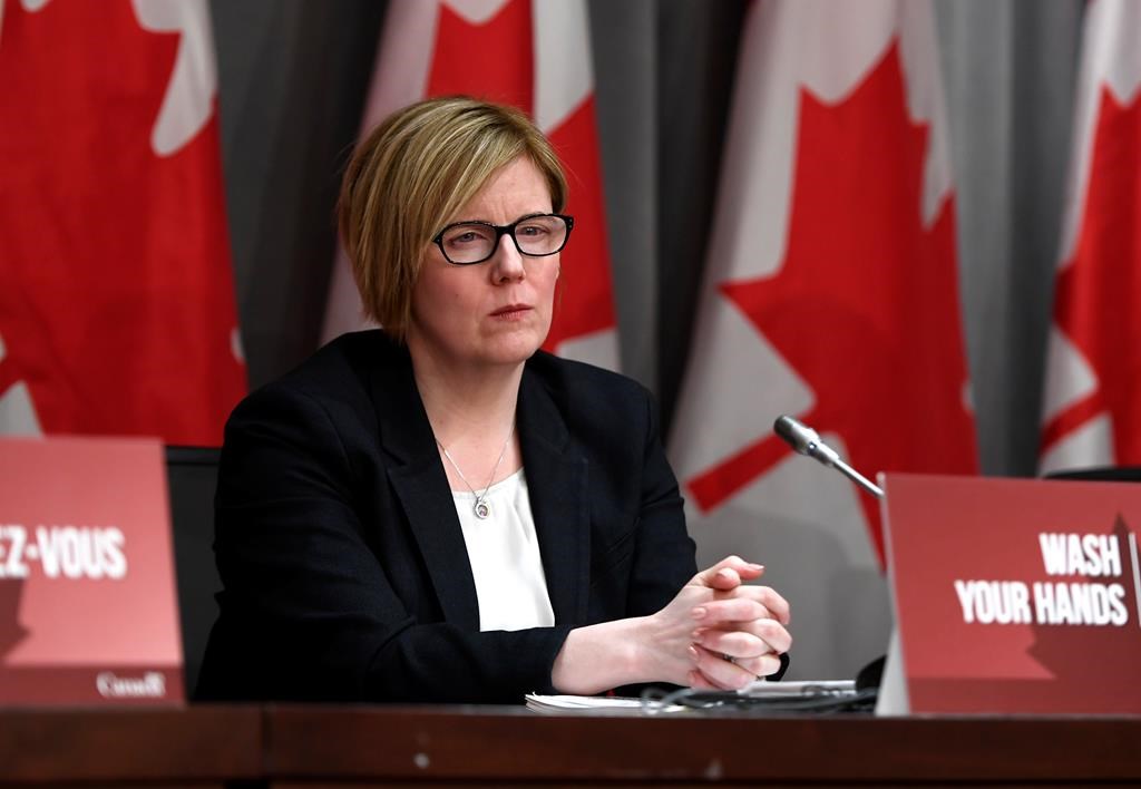 Minister of Employment, Workforce Development and Disability Inclusion Carla Qualtrough listens during a press conference on COVID-19 at West Block on Parliament Hill in Ottawa, on Wednesday, March 25, 2020. THE CANADIAN PRESS/Justin Tang.