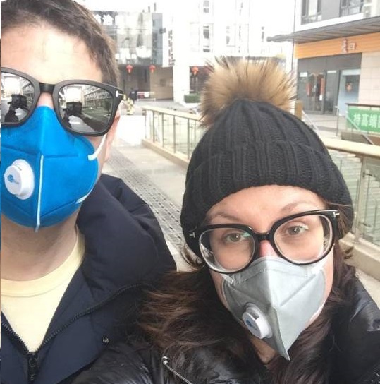 The couple say they wear masks any time they leave their apartment.