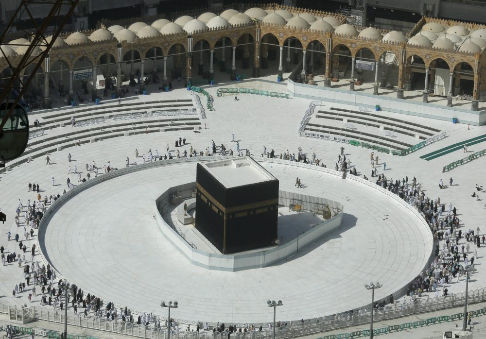 Muslims circumambulate the Kaaba, the cubic building at the Grand Mosque, in the Muslim holy city of Mecca, Saudi Arabia on March 7, 2020.