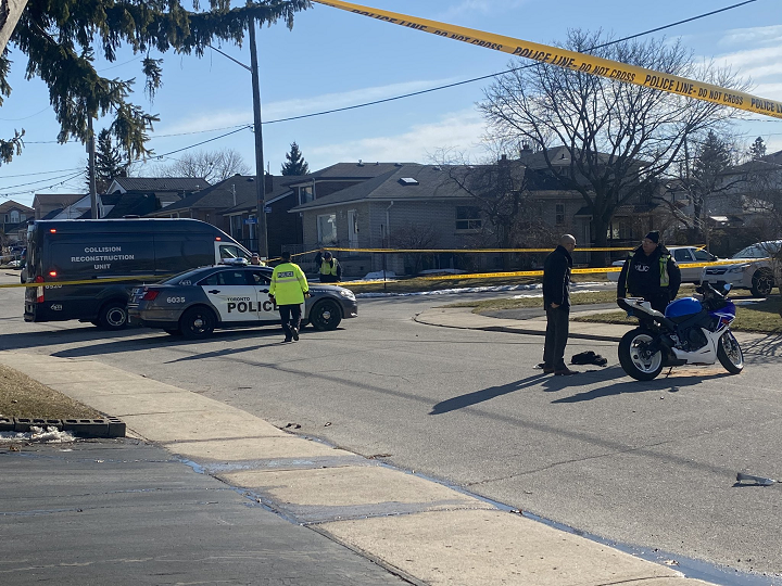 Police at the scene of a motorcycle crash in Scarborough Sunday afternoon.
