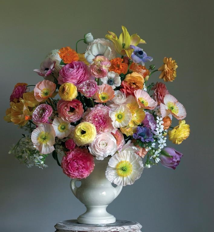 This photo shows a floral display featured in the book "Cultivated: The Elements of Floral Style" by Christin Geall.