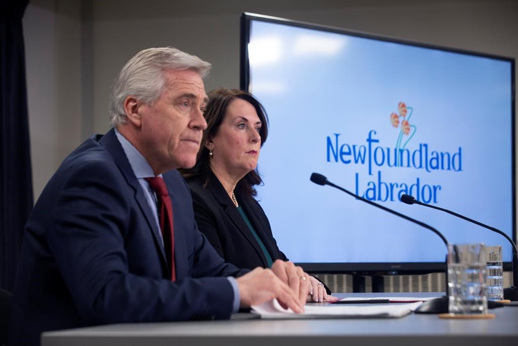 Newfoundland and Labrador Premier Dwight Ball and Natural Resources Minister Siobahn Coady release the report of the Muskrat Falls Inquiry at the Confederation Building in St. John’s on Tuesday, March 10, 2020. THE CANADIAN PRESS/Paul Daly.
