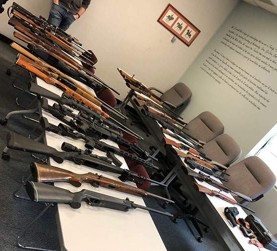 Mounties say they seized 36 firearms, including four restricted weapons, from a rural property near Treherne on Thursday, March 12. A 28-year-old man has been arrested.