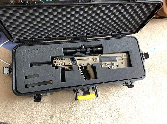Portage la Prairie RCMP say they have seized 36 firearms, including four restricted weapons, from a rural property near Treherne. A 28-year-old man is facing charges.