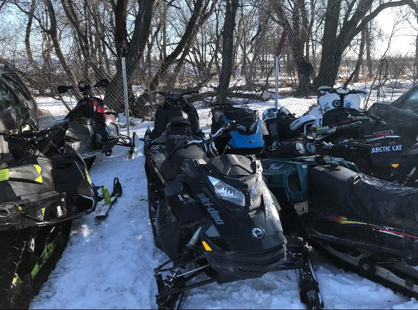 Dauphin RCMP say they recovered 11 stolen snowmobiles, two ATVs and a small quantity of meth at a residence in the RM of Grandview last Friday.