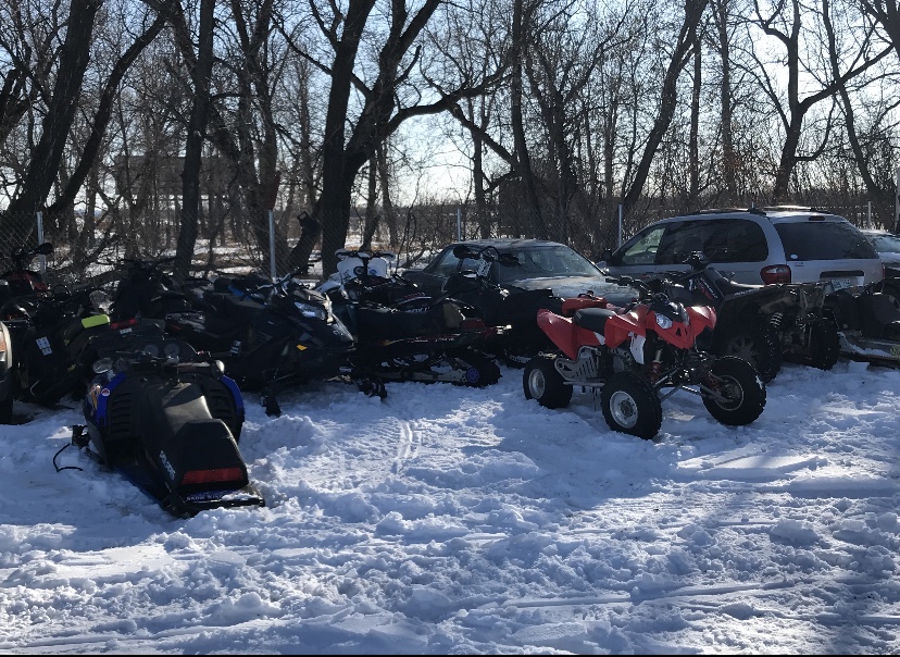 Dauphin RCMP say they recovered 11 stolen snowmobiles, two ATVs and a small quantity of meth at a residence in the RM of Grandview last Friday.