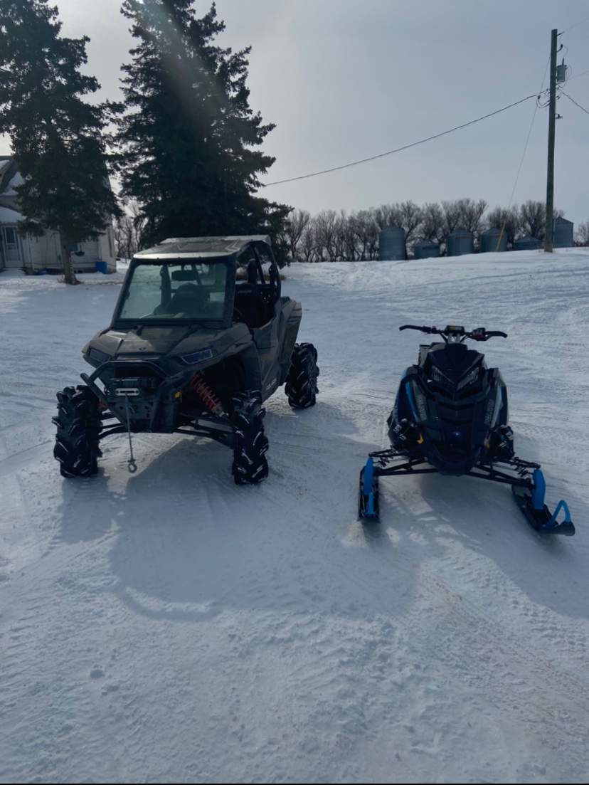 Dauphin RCMP say they recovered 11 stolen snowmobiles, two ATVs and a small quantity of meth at a residence in the RM of Grandview last Friday.