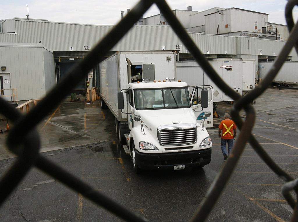 A driver pulls into the truck delivery bay. The erosion of Canada's supply chain has forced truckers to log a lot of miles without a load - leading to financial issues.