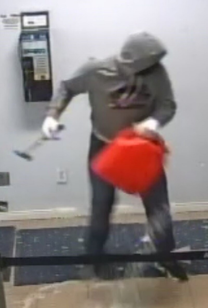 Toronto police have released photos of two male suspects wanted in an arson investigation at East Collision Reporting Centre in Scarborough.