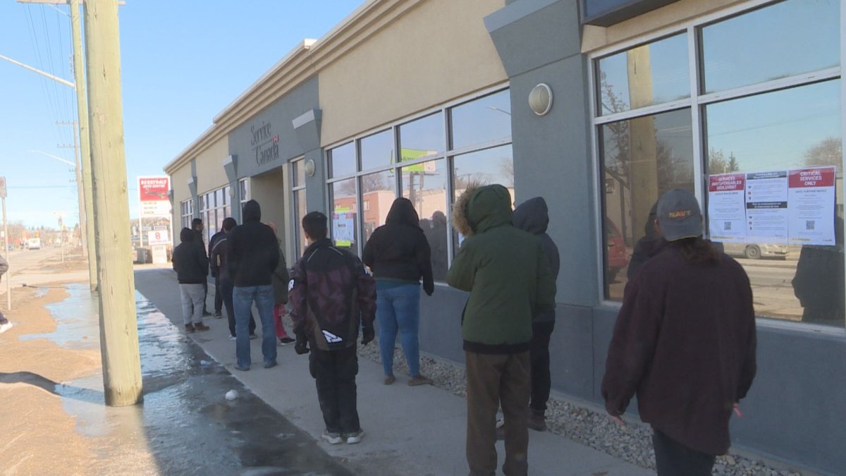 People lined up outside the Service Canada location on St. Mary's Road Wednesday morning. 