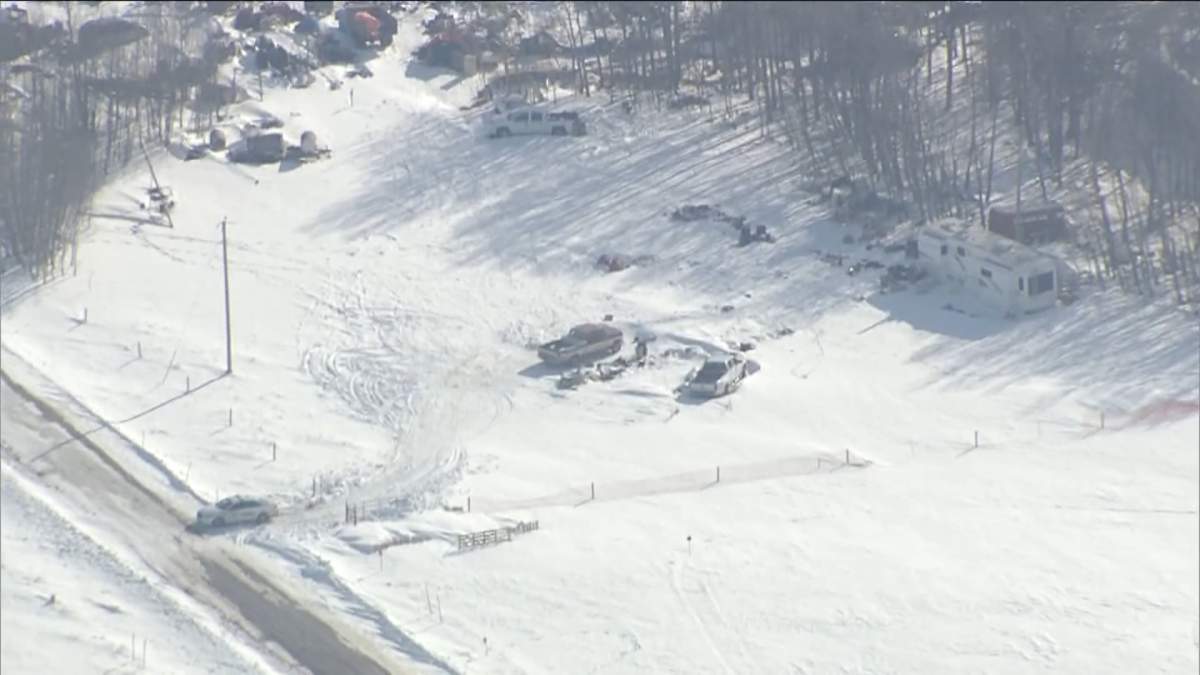 Olds RCMP investigate at a shooting near Township Road 320 and Range Road 290 on March 20, 2020.