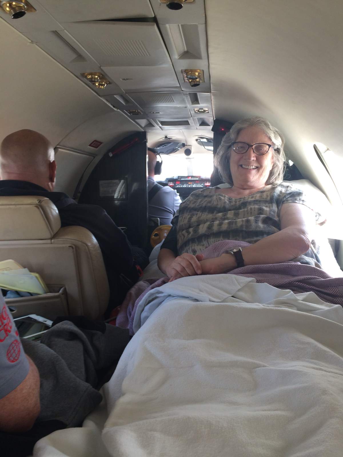 Suki Falkner on board a Global Jetcare plane, on her way back to Kingston, Ont.