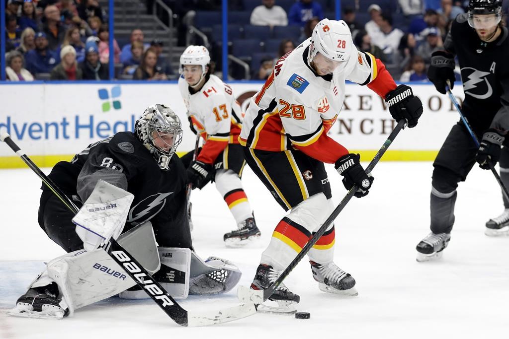 Stamkos scores twice, Lightning beat Devils 4-3 in shootout