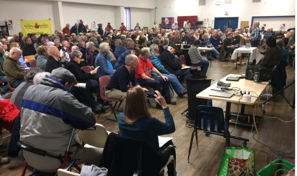 Hundreds of people attended an information session in Upper Tantallon, N.S., on Sunday, March 1, 202 on the risks associated with open-pen fish farms. 
