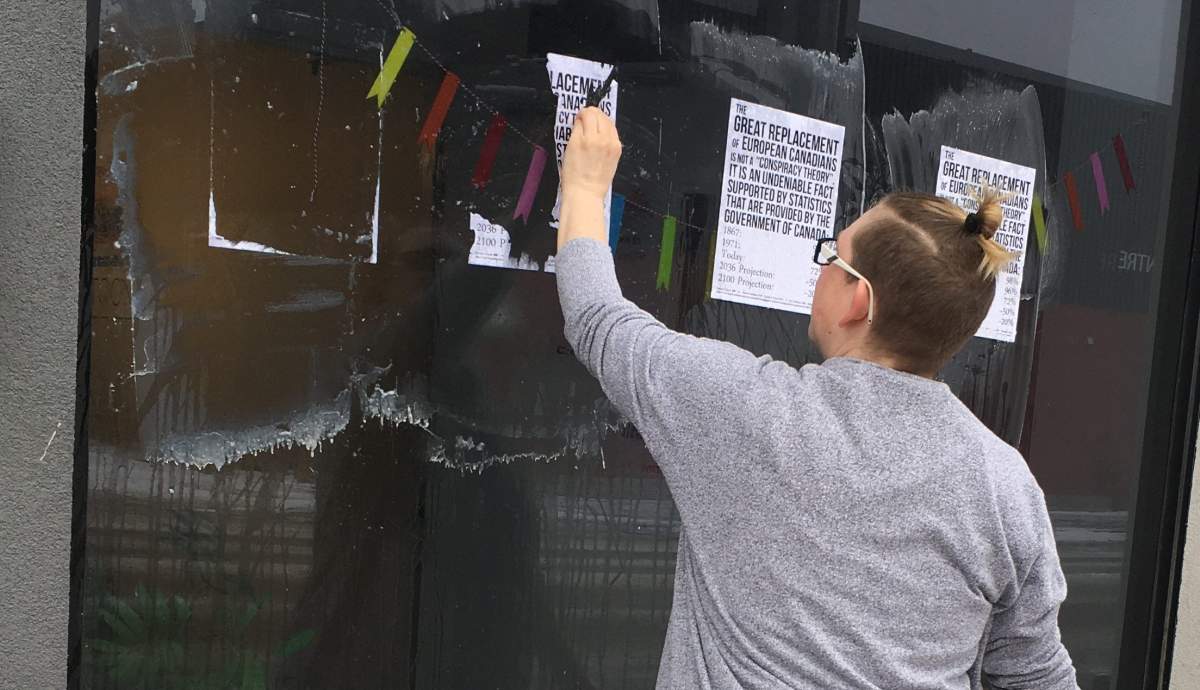 The posters were glued to the windows and walls of the OUTSaskatoon and Open Door Society buildings.