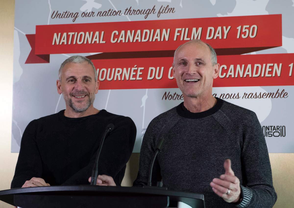 Actors Patrick Huard (left) and Colm Feore announce National Canadian Film Day 150 at an event in Toronto on Monday, Nov. 21, 2016.