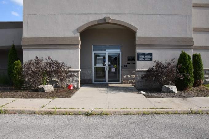A small gas can sits near the entrance of the Immigration, Refugee, and Canadian Citizenship office in the city's south-end. 