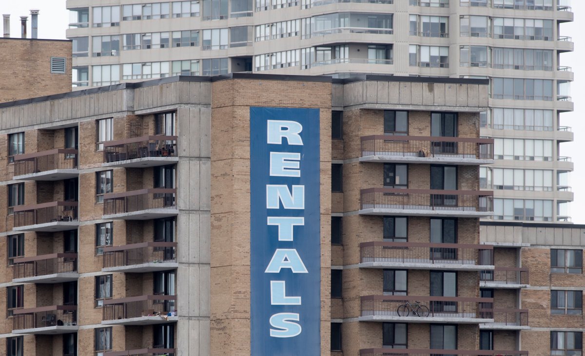 A rental sign hangs on the side of an apartment building in this file photo.