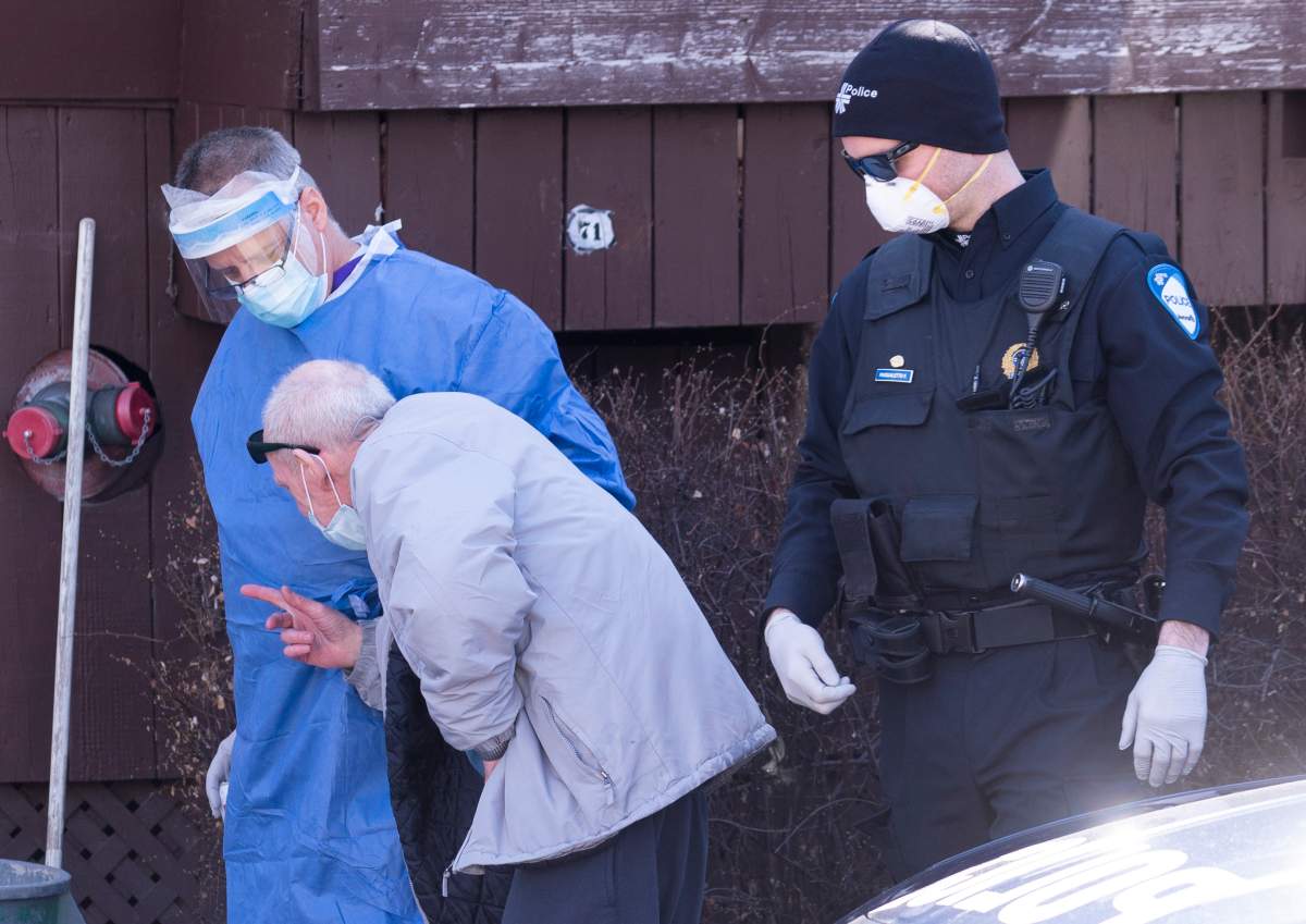 Police return a resident of the Yvon-Brunet seniors residence after having wandered away in Montreal, on Thursday, April 16, 2020. 