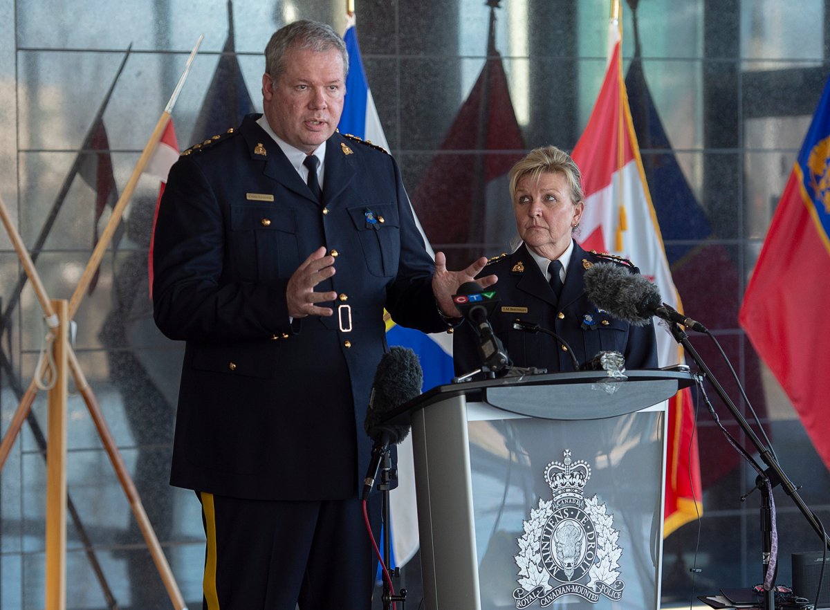 RCMP Chief Superintendent Chris Leather, left, and Assistant Commissioner Lee Bergerman field questions a news conference at RCMP headquarters in Dartmouth, N.S. on Sunday, April 19, 2020.