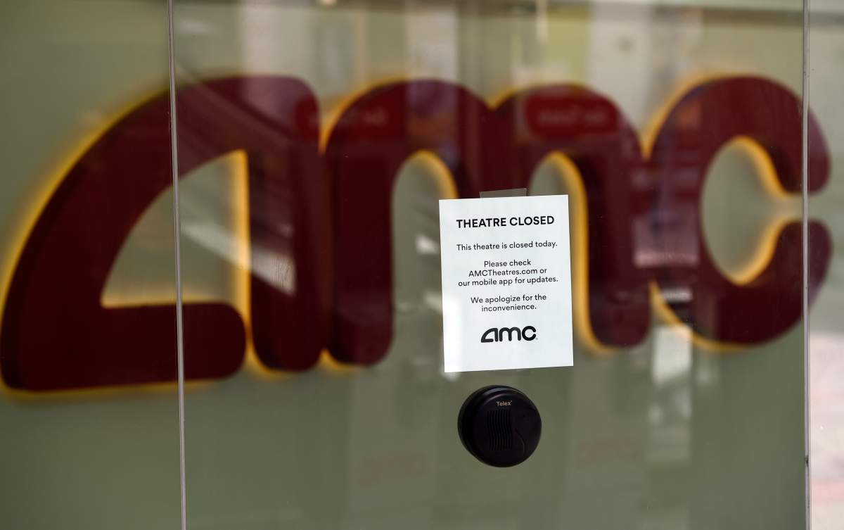 A message on the ticket window at the AMC Burbank 16 movie theaters complex informs potential customers that it is currently closed, Wednesday, April 29, 2020, in Burbank, Calif.