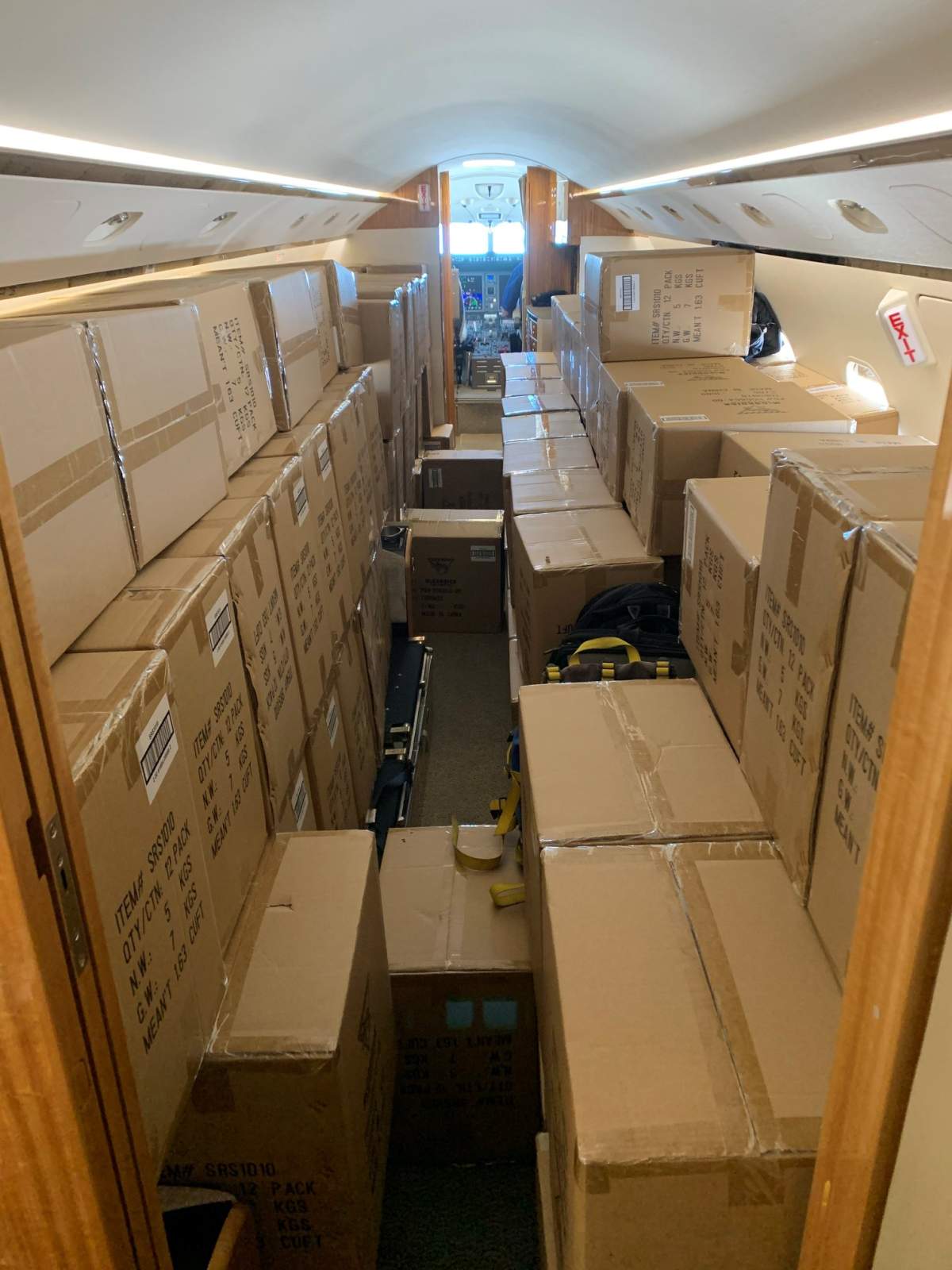 A plane loaded with N95 masks donated by Suncor Energy Inc.