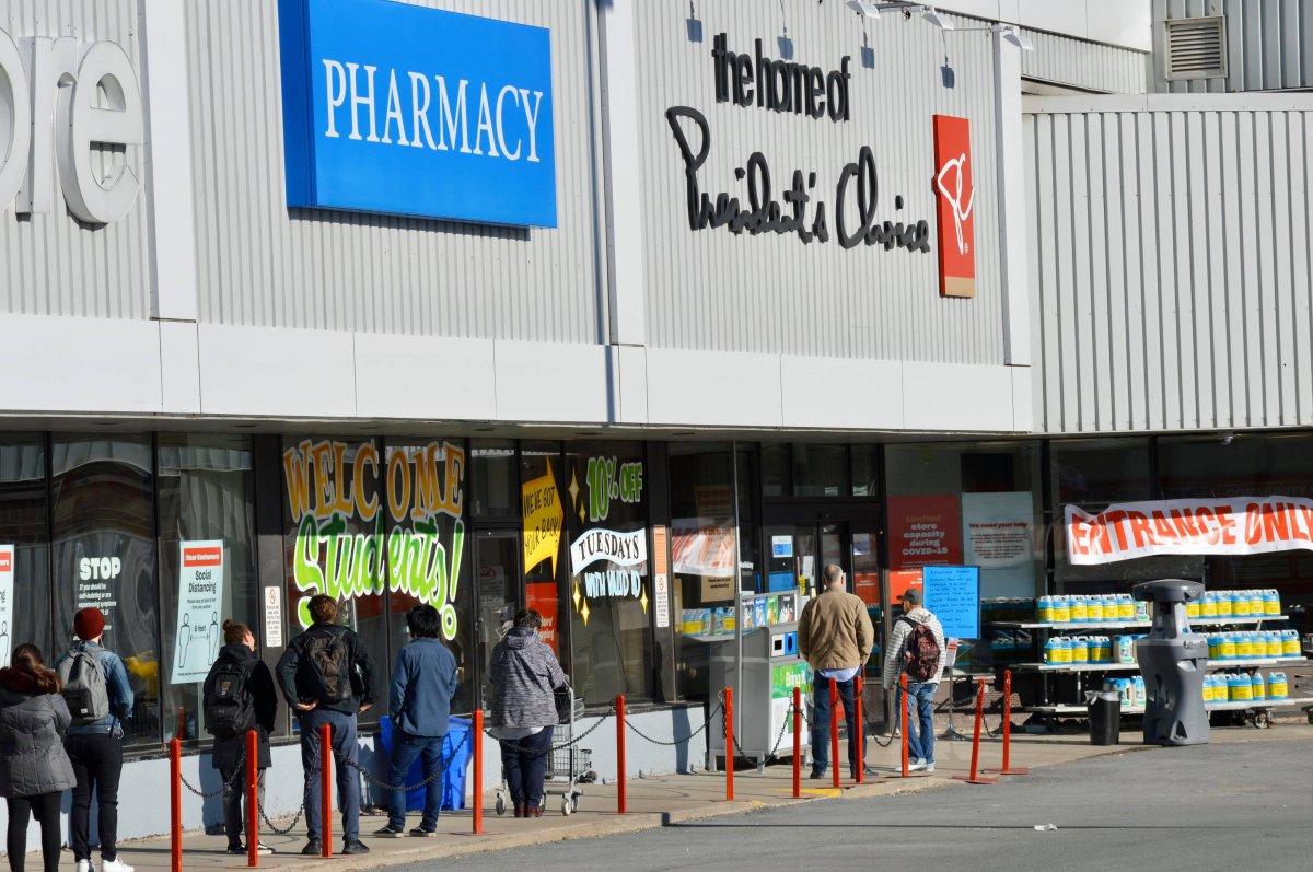 File - A line up outside of an Atlantic Superstore in Halifax, N.S., on April 8, 2020. 
