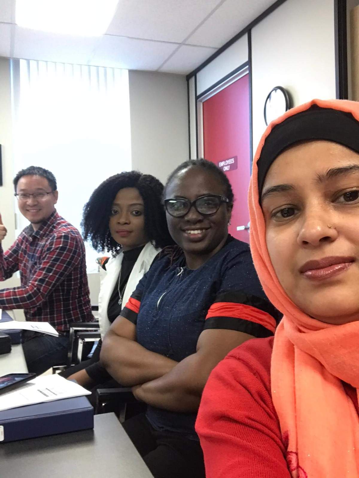 Bola Oyewole, second from left, is pictured at a Regina Open Door Society class with her classmates.