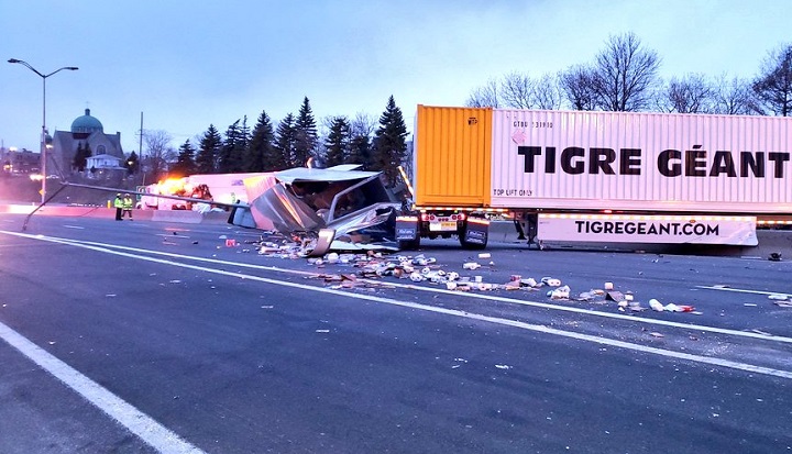 A tractor-trailer flipped over on Highway 401 in Oshawa Monday evening.