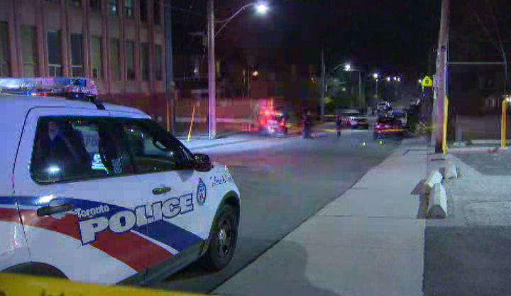 Toronto police block off part of Winona Drive after a shooting Wednesday evening.