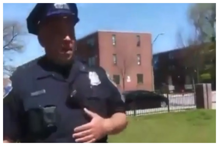 A Baltimore police officer appears to force out a cough in this image from video posted on Instagram on April 7, 2020.