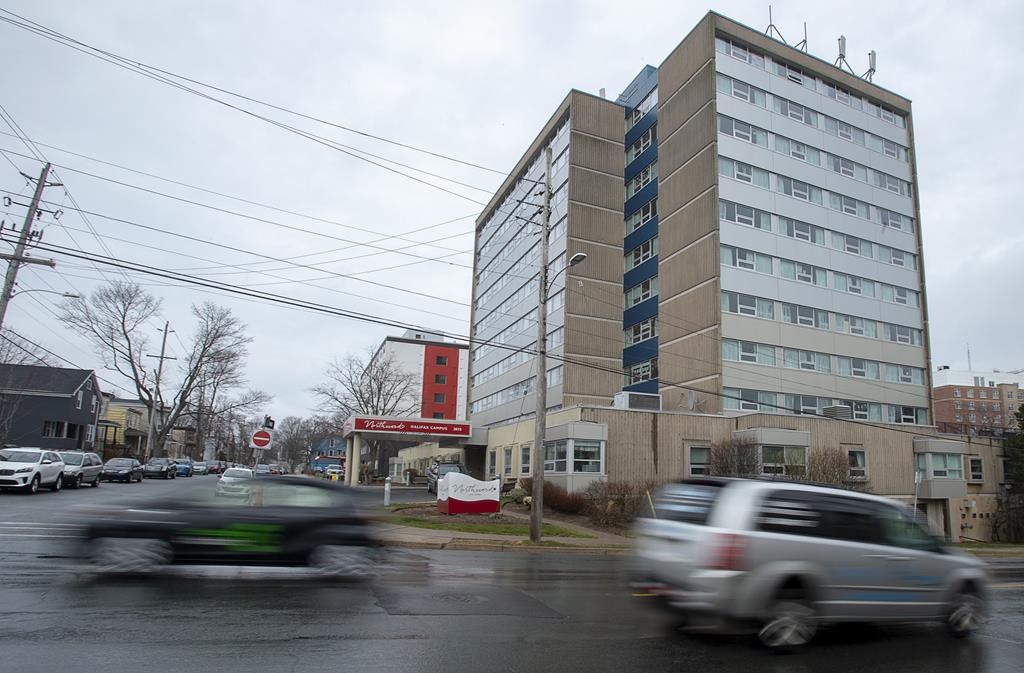 Cars head past Northwood Manor in Halifax on Monday, April 13, 2020. THE CANADIAN PRESS/Andrew Vaughan.
