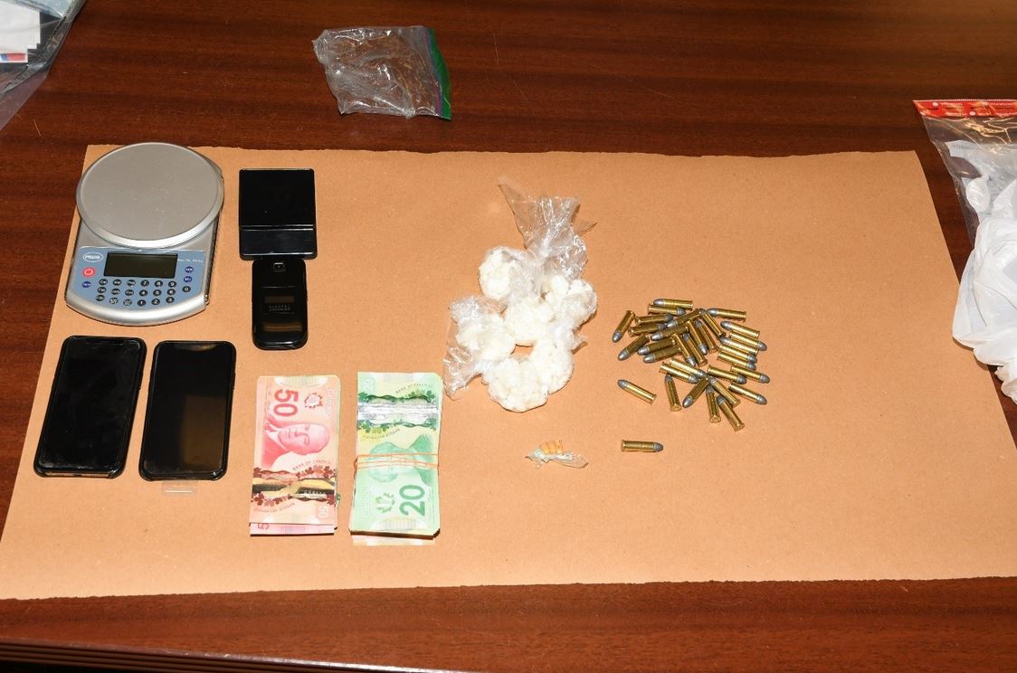 Two Londoners are facing charges after police executed search warrants on Friday, April 17.