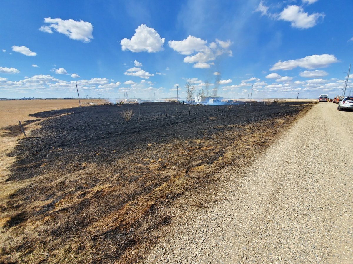 Water had to be shuttled out to fight the fire which burned throughout the afternoon on a property north of the Trans-Canada Highway.