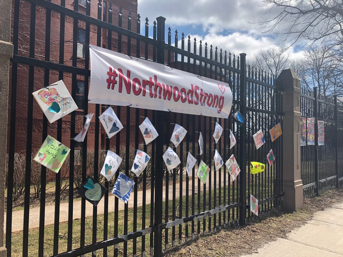 Signs of support on the fence across the street from the Northwood Manor in Halifax, N.S., on April 23, 2020. 
