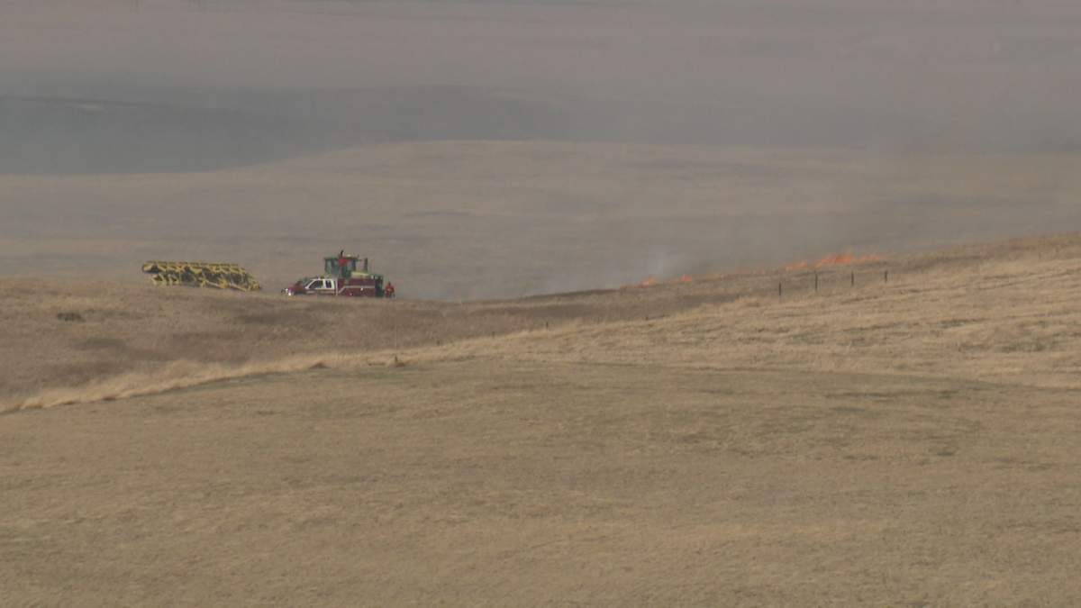 Crews responded to a grass fire in Rocky View County that spread to Calgary on Sunday, April 26, 2020.