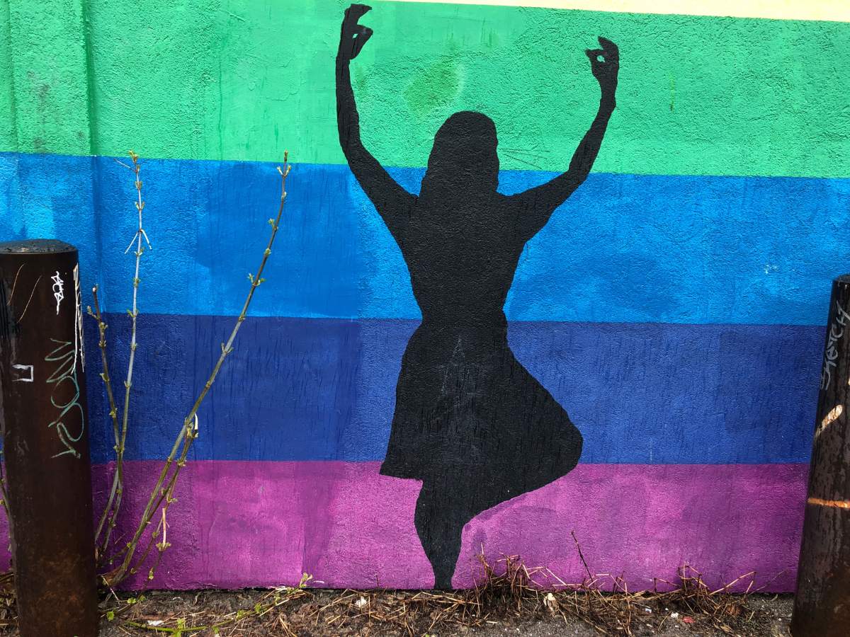 Artist Justine Landry in 2012 painted a silhouette of Abbigail Cowbrough as part of her mural in downtown Peterborough. (Katrina Squazzin/Global News photos)