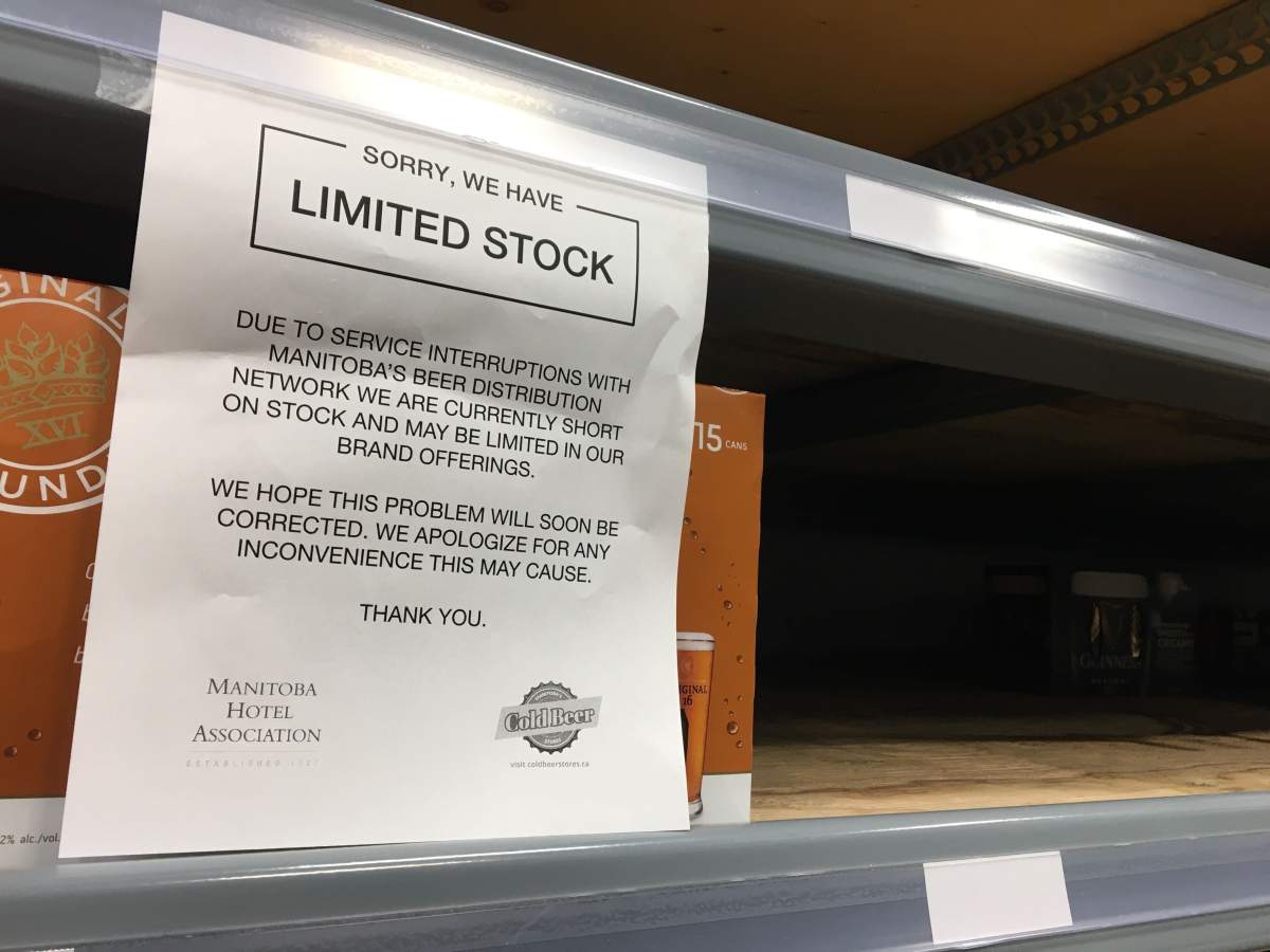 Signs warn of beer shortages at Manitoba vendors.