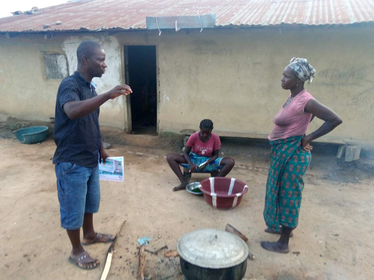 One-on-one awareness before COVID-19 arrives in Liberian towns and villages.