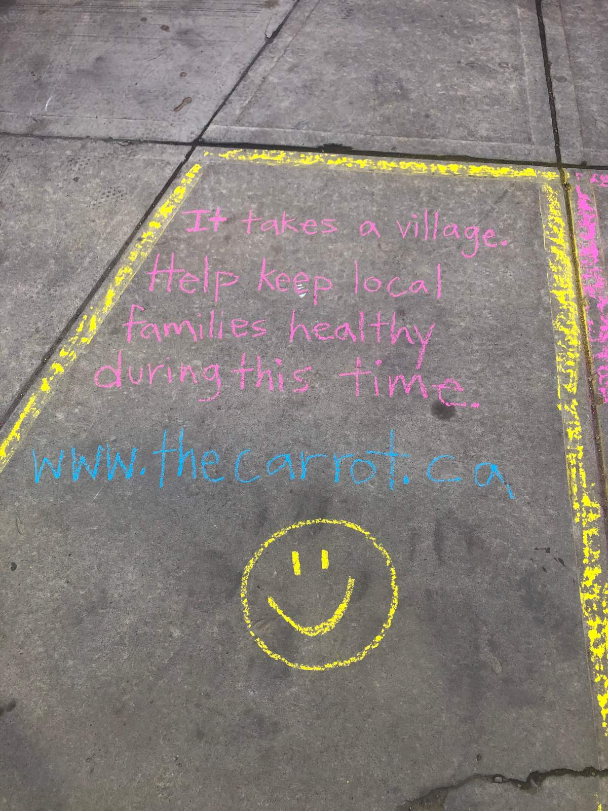 Chalk art on Alberta Avenue in April 2020
