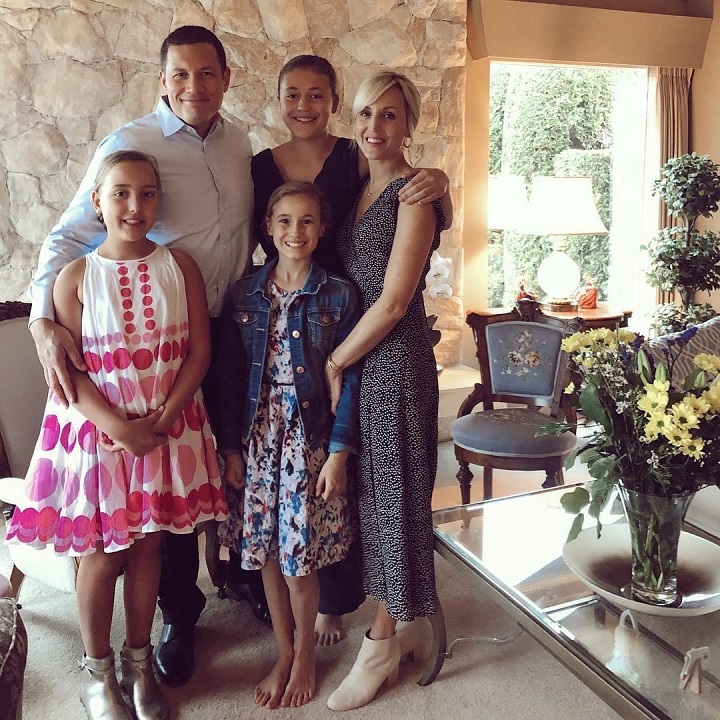 Kirk and Jaclyn Robinson and their three kids.