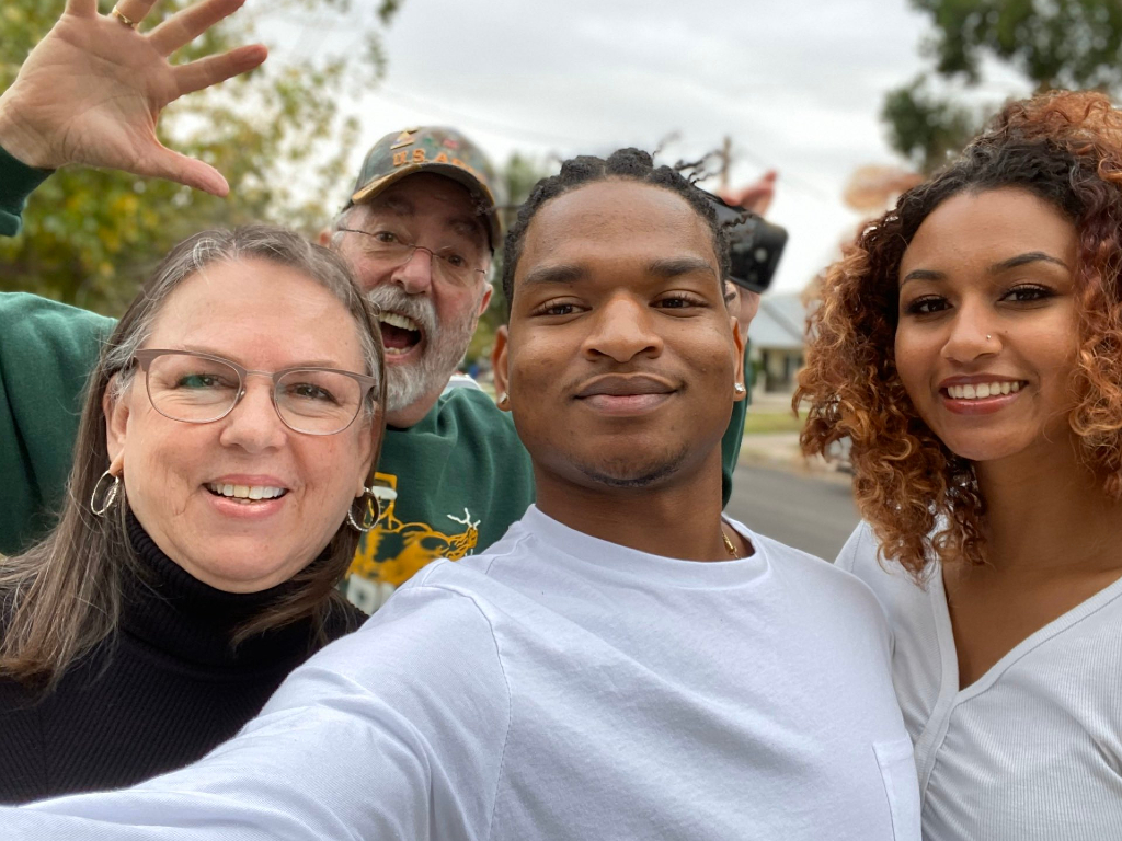 In 2016, Jamal Hinton received an accidental text from Wanda Dench inviting him for Thanksgiving dinner. Four years later, Dench's husband died of COVID-19.