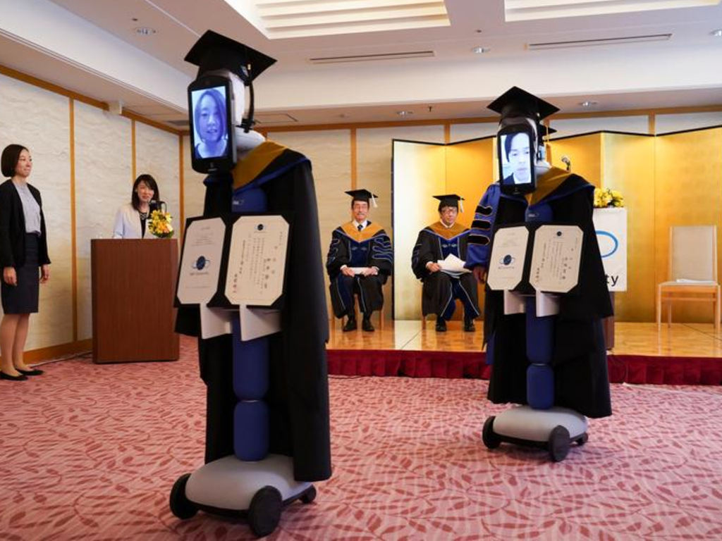 Amid the novel coronavirus outbreak, Japanese students are graduating virtually with an iPad attached to a 'newme' robot.